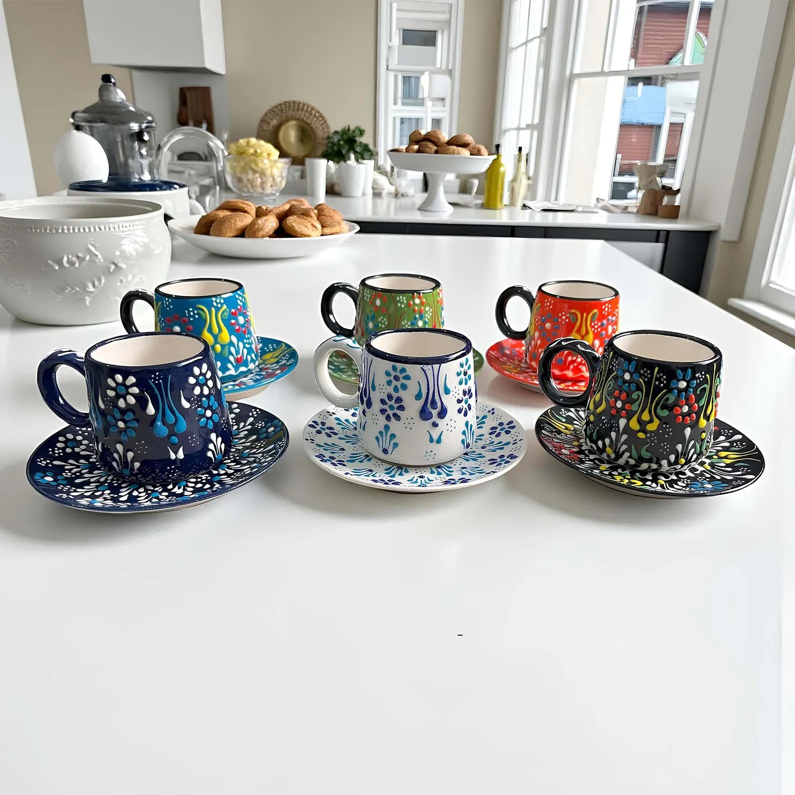 Set of six brightly hand-painted Turkish-style ceramic cups and saucers